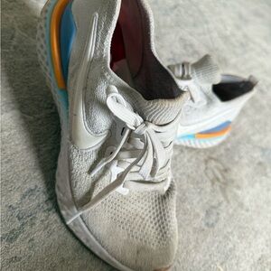 Nike Gray Sneakers with Blue and Orange Accents